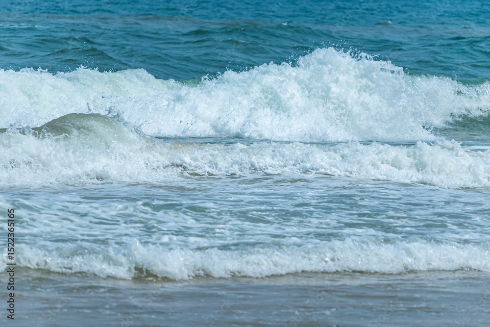 Fototapeta premium The blue sea on the beach