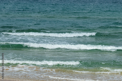 The blue sea on the beach
