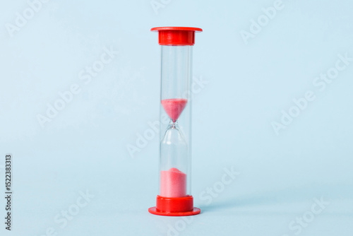 hourglass on the table, sand clock as time passing concept for business deadline, copy space