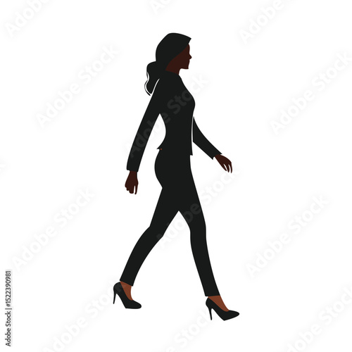 Confident black businesswoman walking forward silhouette