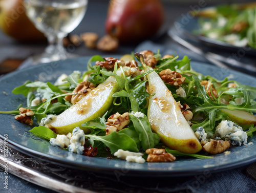 Fresh pear and gorgonzola salad with arugula and nuts