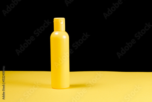 Yellow bottle in minimalist style