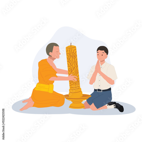 A young Thai student offers a candle to a monk during Khao Phansa at a temple