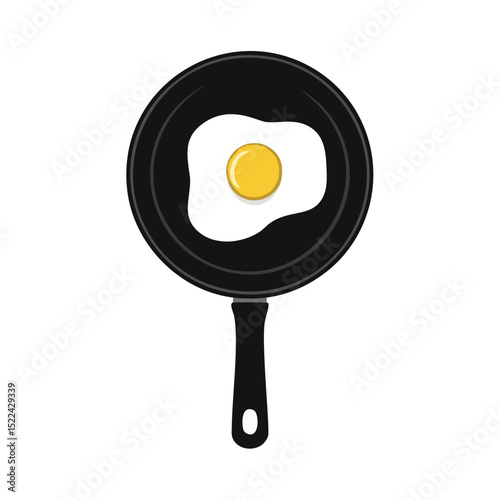 Single fried egg in black frying pan breakfast food