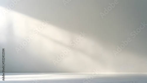 Minimalist backdrop with soft light and shadow perfect for product photography and design