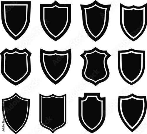 A collection of black and white shield icons with various shapes and vector design elements