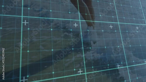On grid activation, bare foot descending into rippling water for mapping shoreline movement