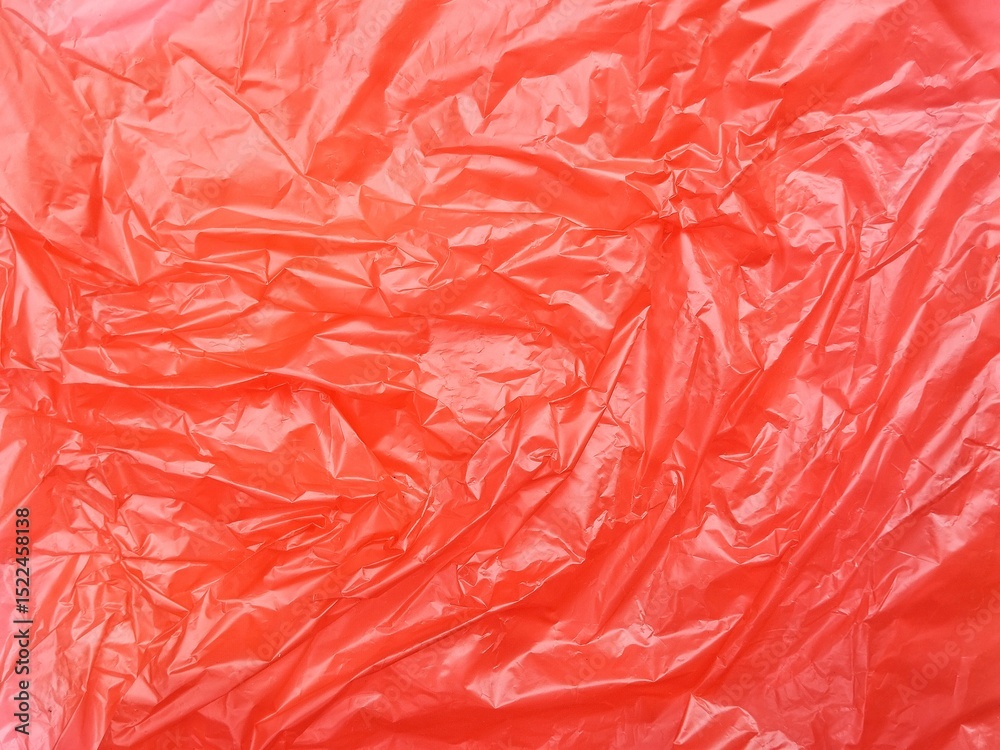 Fototapeta premium Abstrak crumpled red plastic bag texture background