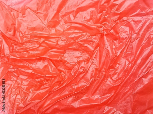 Abstrak crumpled red plastic bag texture background