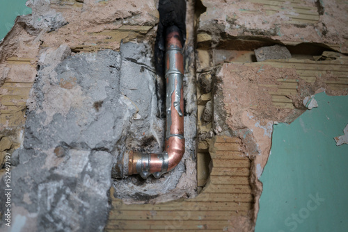 Plumbing pipe in exposed wall for home repair DIY