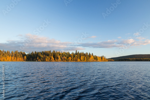 Autumnal lake scenery in Sweden during sunset