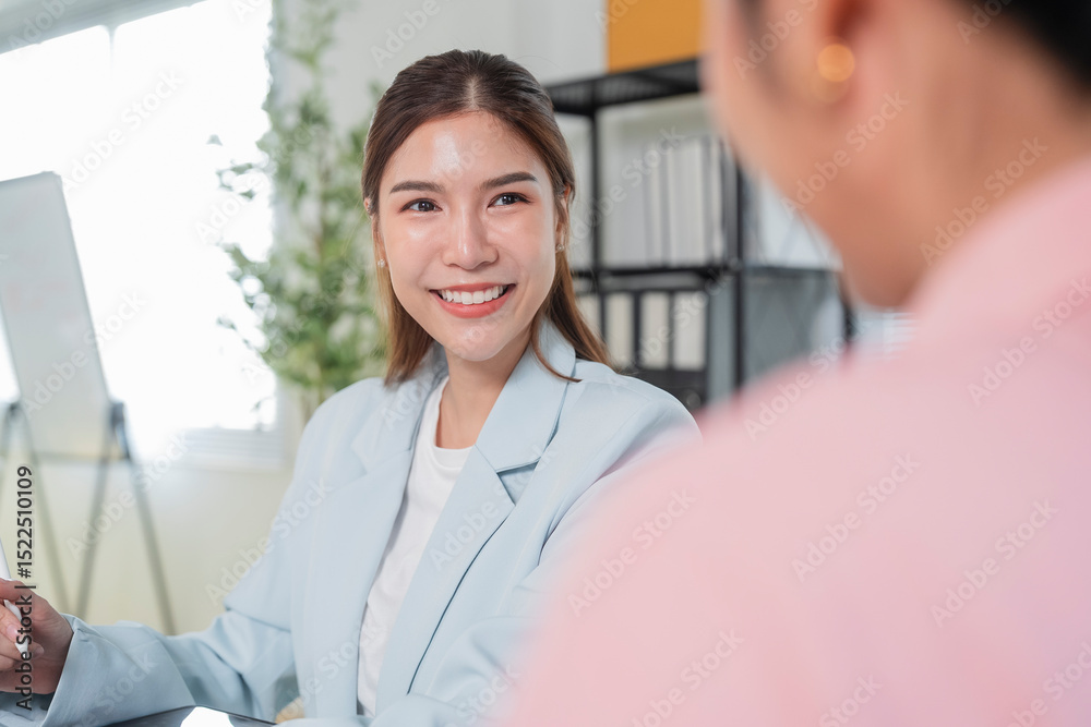 Fototapeta premium diverse team of business professionals actively engages in a strategic meeting focused on financial planning, goal alignment, and agile execution. With open laptops, financial reports graph chart 