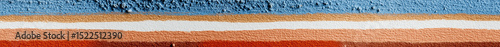 Stylized painted stripes in sky blue, terracotta, and sand beige