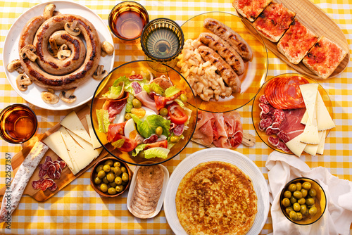 Catalan feast with traditional salad and sausages photo