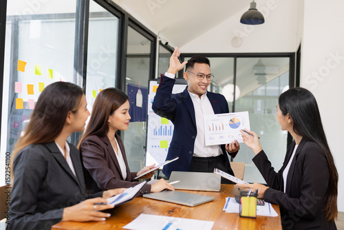 Group of business people working together with dashboard analysis and data management a meeting table in office.