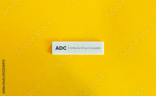 Antibody Drug Conjugate Concept on Yellow Background – Minimalist Pharmaceutical Theme