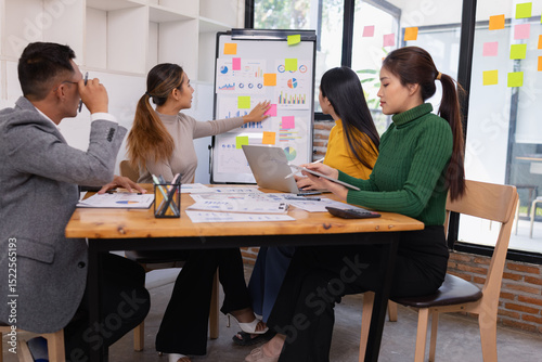 Group of business people working together with dashboard analysis and data management in conference room, Corporate business and dashboard to presentation concept.