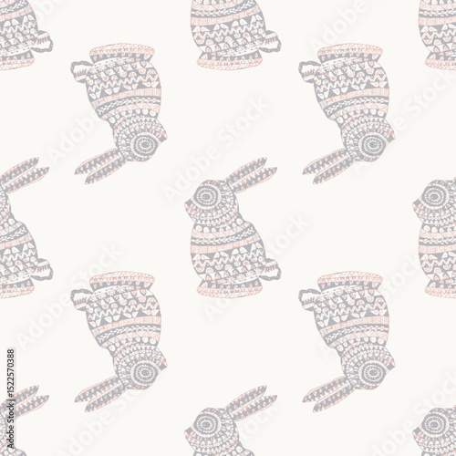 seamless pattern with beige silhouettes of a Rabbit textured pattern background.