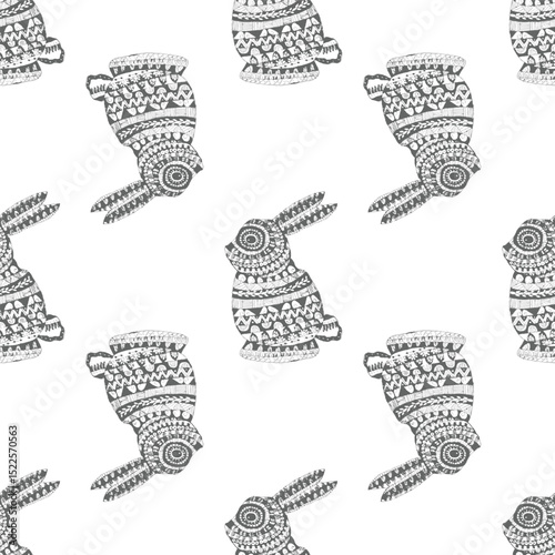 seamless pattern with white and black silhouettes of a Rabbit textured pattern background.