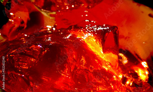 Sort blur effect of abstract full frame background of red orange jam, jelly, rosin