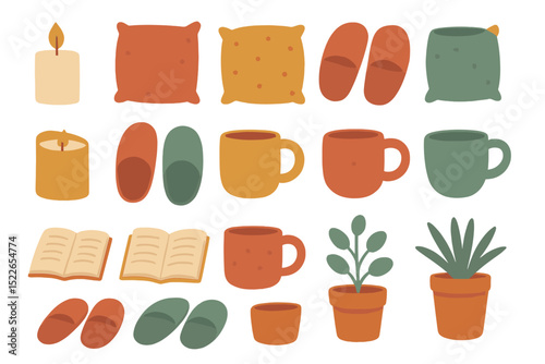 Cozy home decor elements including candles, plants, and cushions for a warm atmosphere during autumn evenings