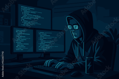 Young coder works late into the night while programming on dual monitors in a dimly lit room
