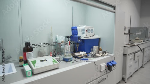 Compact niche houses precise pH meters and analytical tools. Organized layout supports efficient chemical testing along with research