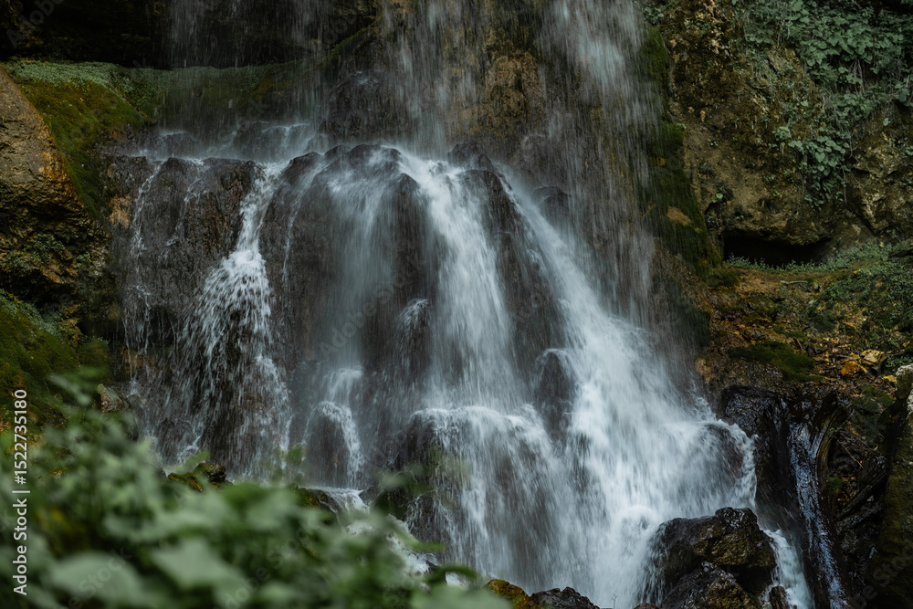 Fototapeta premium Waterfall Crashing on Rocks