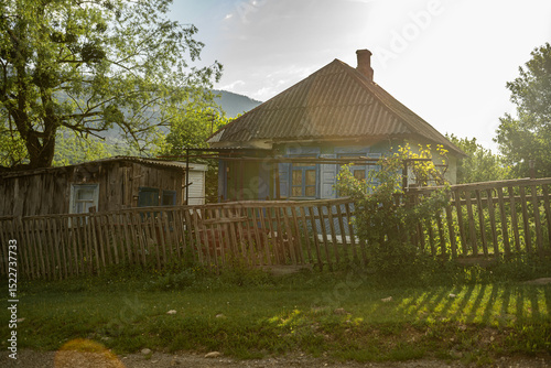 Village House with Old Fence