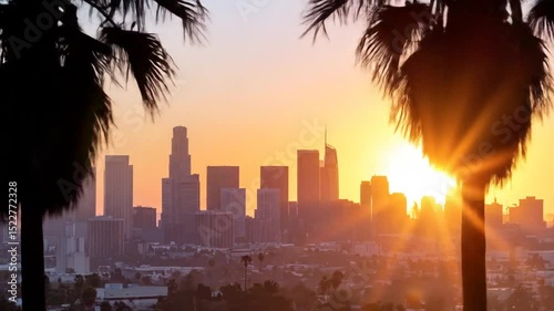 Los Angeles Skyline at Sunset with Palm Trees, A Golden Hour Urban Scenery