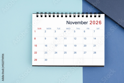 Wallpaper Mural November 2026 monthly desk calendar for 2025 year on blue background. Torontodigital.ca