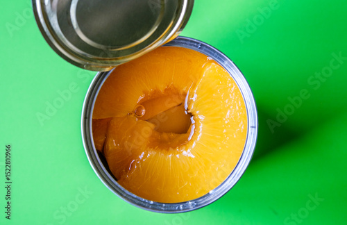 Open Tin Or Can Of Sliced Peaches Dessert Or Cooking Ingredients