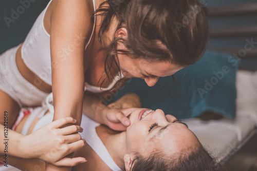 Принти на полотні Homosexual couple lifestyle moments at home