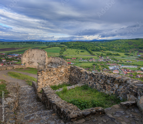 Rupea is an ancient fortress on a 120-metre high basalt cliff in the western part of the town of Rupea, 70 km north of the city of Brasov on the ancient road towards Sighisoara in central Romania.