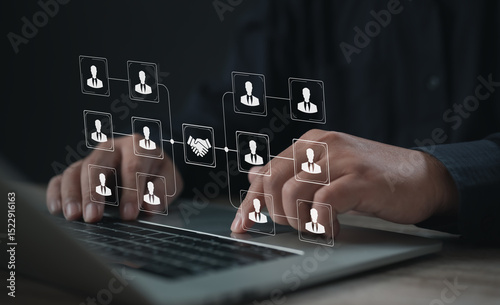 Business network interface showing connection of people and handshake icon on laptop screen. Perfect for teamwork structure, corporate communication, and digital partnership system.