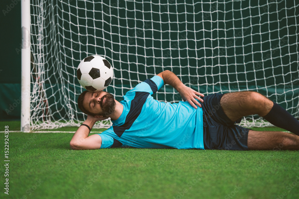 Naklejka premium Cinematic image of a soccer freestyle player making tricks with the ball.