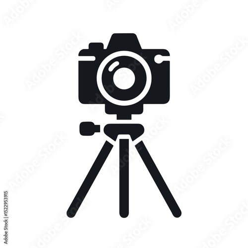Digital camera on tripod in minimalist black design  
