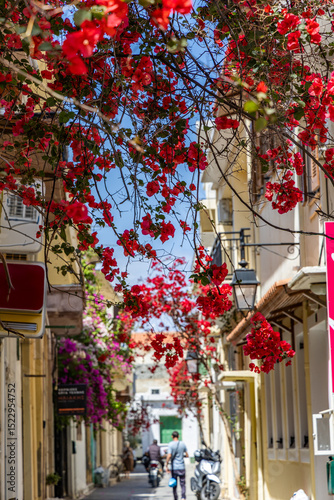 Fototapeta Naklejka Na Ścianę i Meble -  A Mediterranean old town. Historic buildings stand in narrow streets. Daytime city view in Rethymno, Crete, Greece