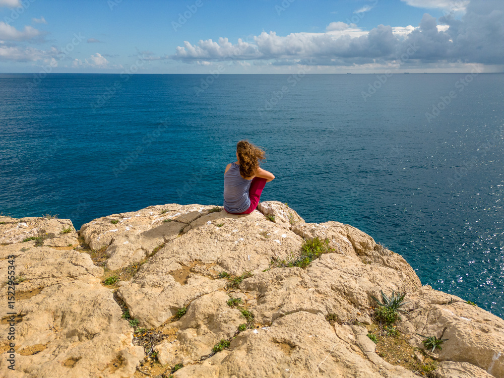 Young woman enjoying ocean view at Costa Blanca Young woman enjoying ocean view at Costa Blanca