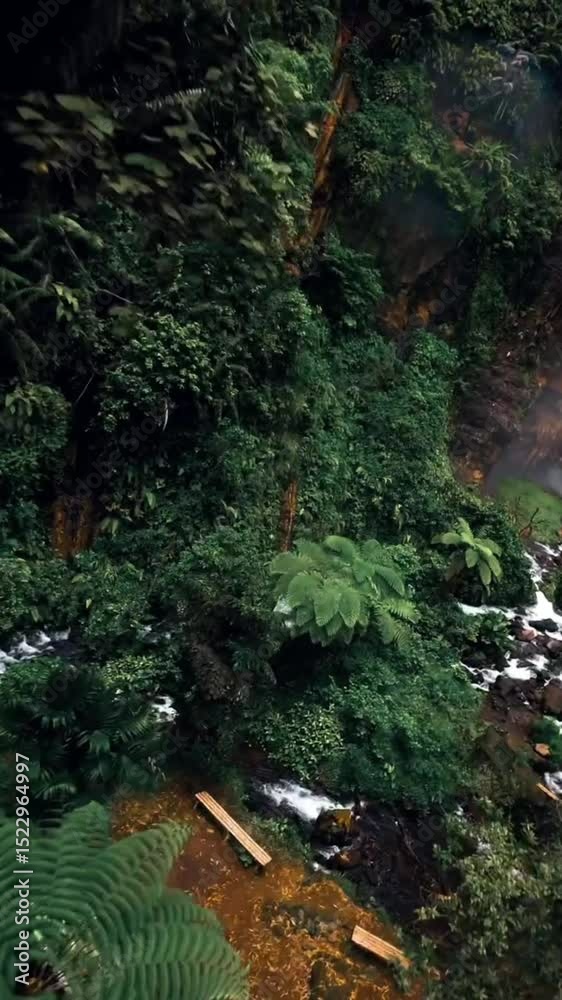 aerial view of blue cotton waterfall indonesia