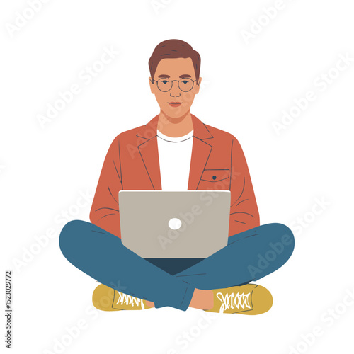 Young man working on laptop computer sitting cross legged on floor home flat adult style