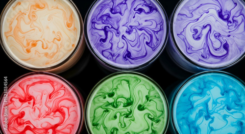 Vibrant Liquid Vortices An Array of Colors Swirling in Conical Glassware
