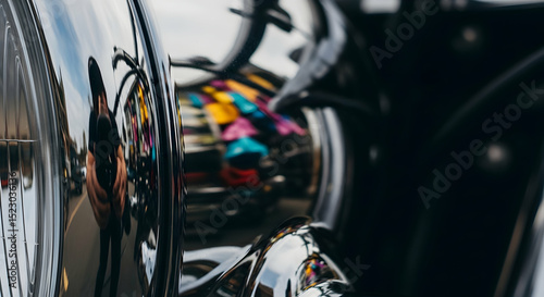 Chromed Reflections Capturing Streetscape On The Classic Motorbike Headlight