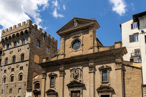 Renaissance-style facade of the Basilica di Santa Trinita, a historic church in the city center of Florence, Italy