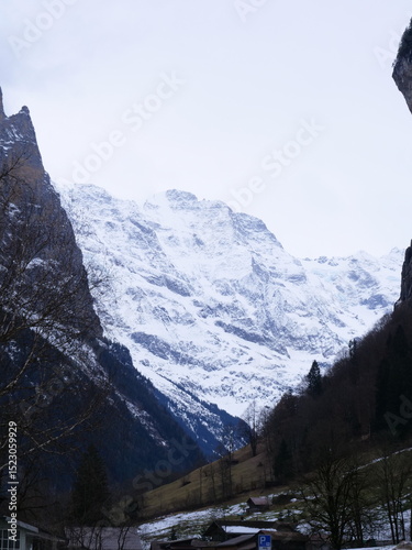 A view of the mountains and the high cliffs. Lauterbrunen, Switzerland - February 12, 2025. photo