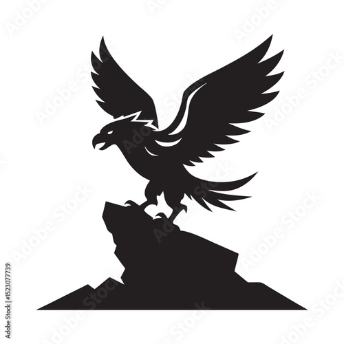 Eagle Landing On Rocky Cliff