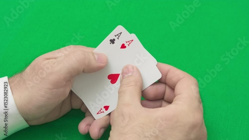 full house poker, three aces and two tens, slow motion
