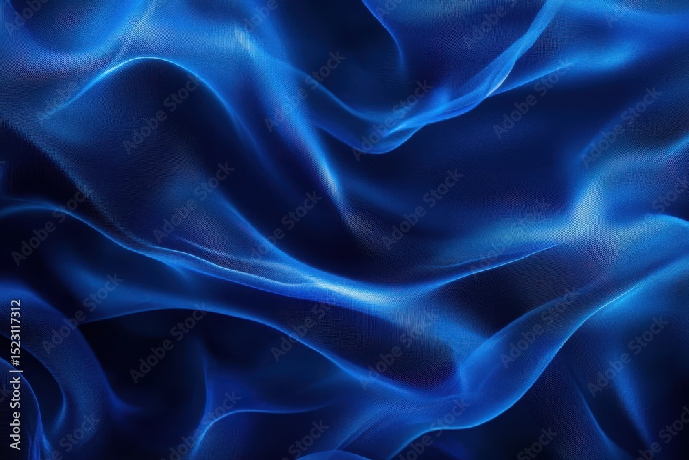 Obraz premium Fluid blue fabric flowing gracefully under light
