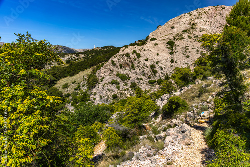 Fototapeta Naklejka Na Ścianę i Meble -  Hiking trail through the mountains from Baska to Vela Luka beach on the island of KRK Croatia