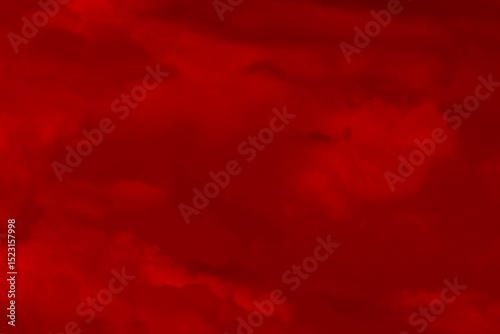 Red cloud texture background. Blurred photo of red sky with clouds. Photo can be used for galaxy space, New Year, Christmas and all celebrations backgrounds.